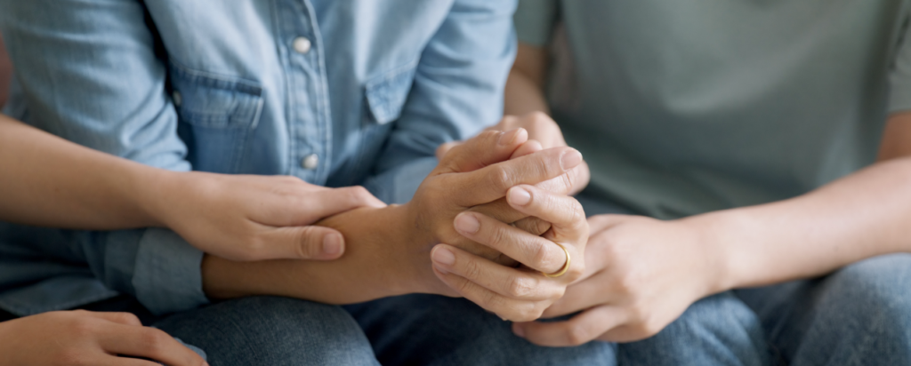 holding hands stressed family
